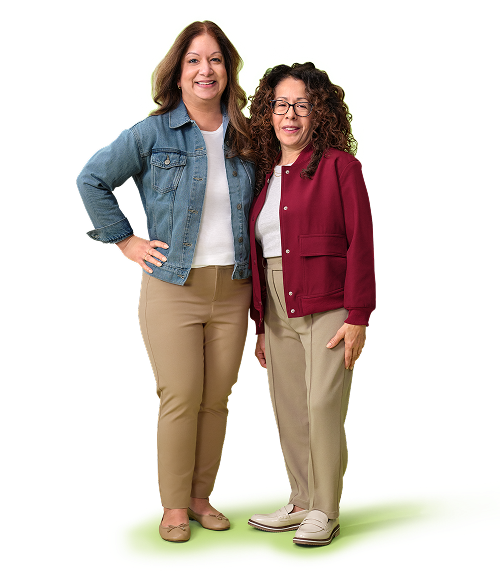 Sunindiya and Raquel, both living with XLH, standing together and smiling